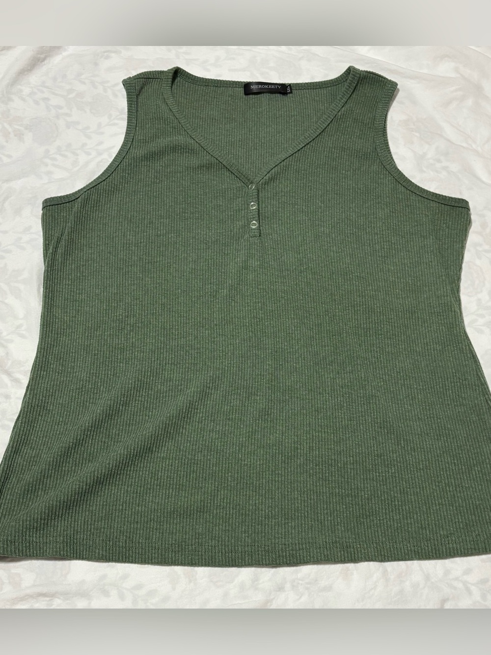 Green sleeveless top